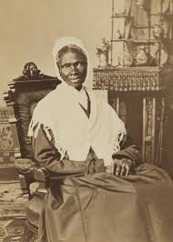 Sojourner Truth seated with knit shawl